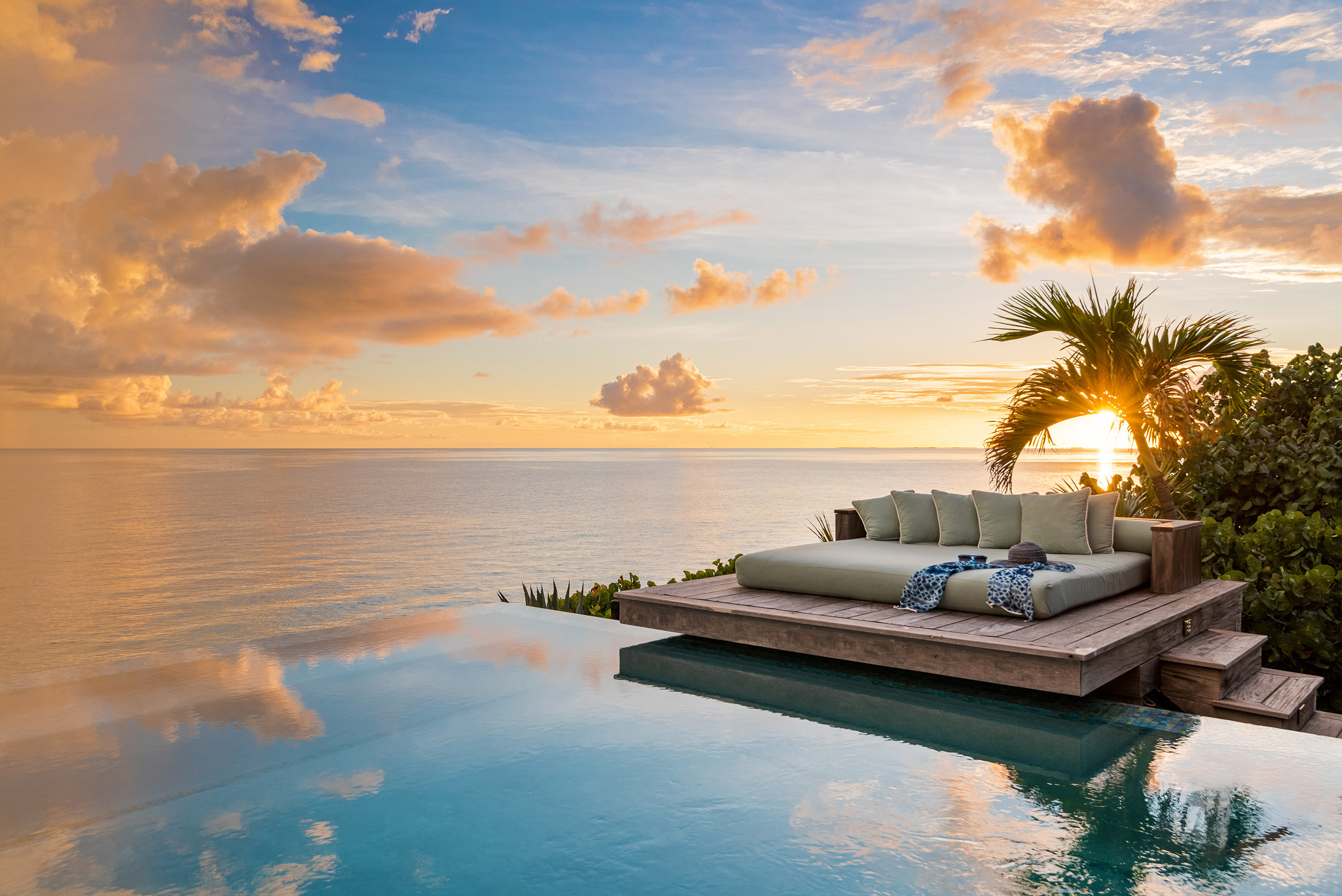Dream Big Villa - sunset view across the pool